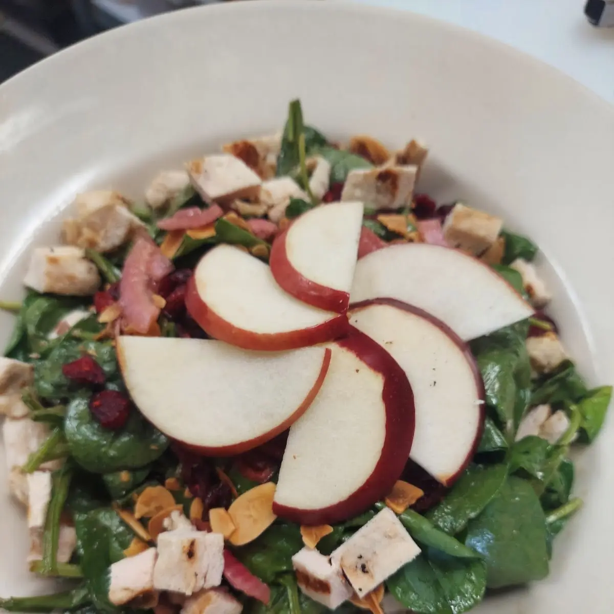 Bunker Salad Baby Spinach Toasted Almonds Dried Cranberries Grilled Chicken and Season Fruit
