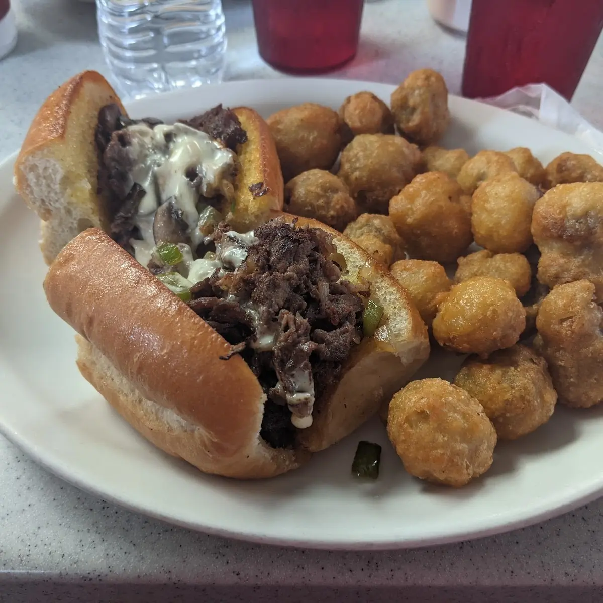 Philly Cheese Steak Sandwich with Fried Mushrooms
