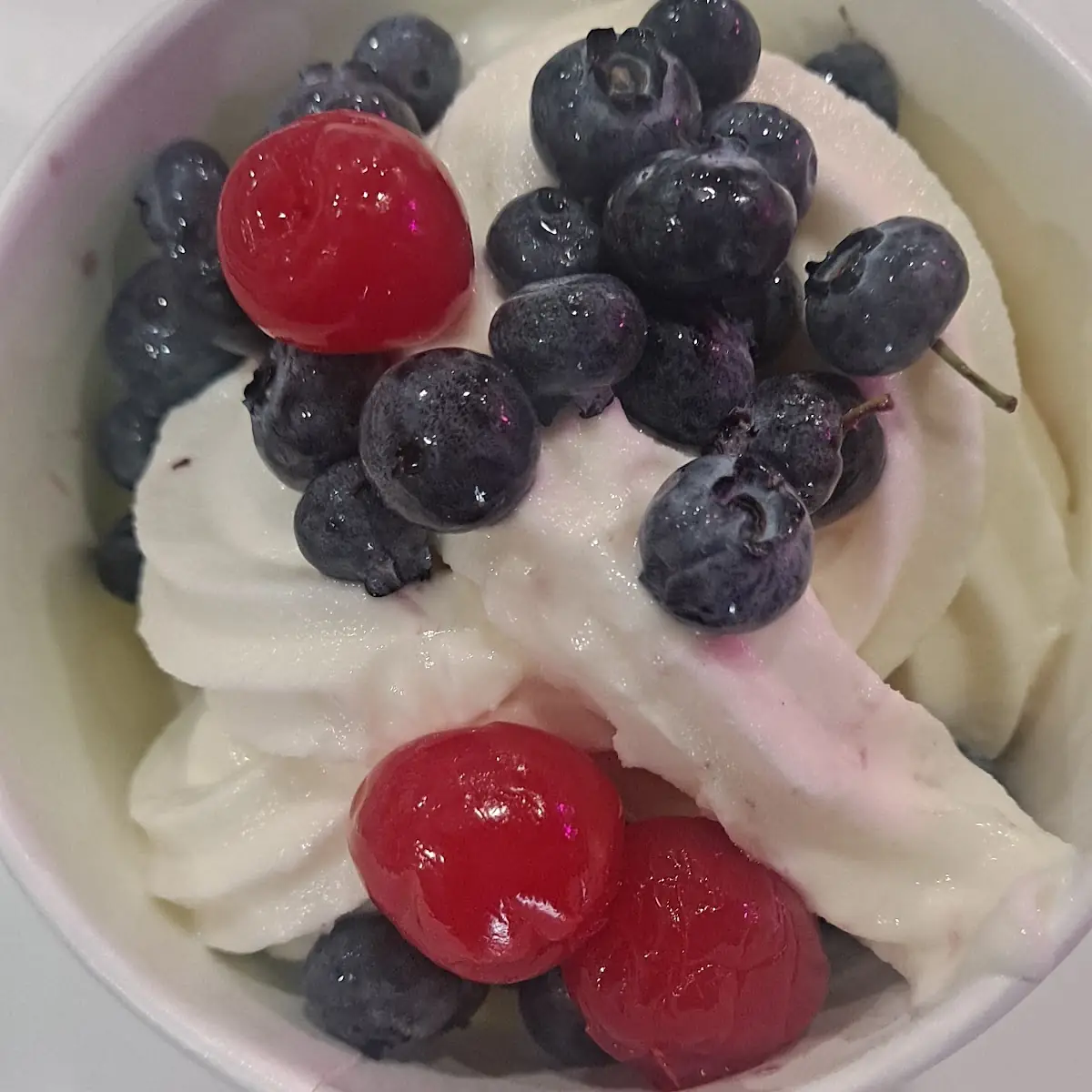 Coconut Flavored Yogurt with Berries on Top