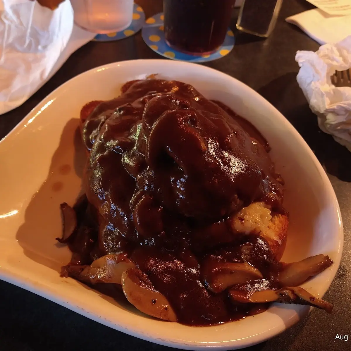 Stuffed Burger on Toast with Mashed Potatoes and Gravy ànd Added Mushrooms