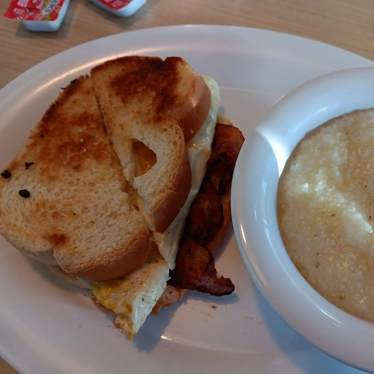 Grits with Butter & Bacon & Fried Egg on Toast