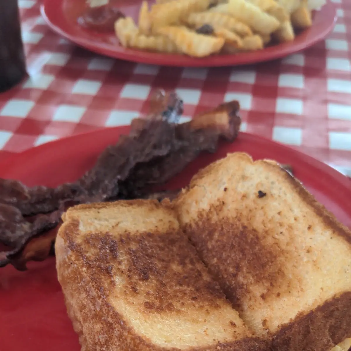 Superdave Sandwich Two Eggs Scrambled with Cheddar Cheese Bacon Extra Crispy on the Side