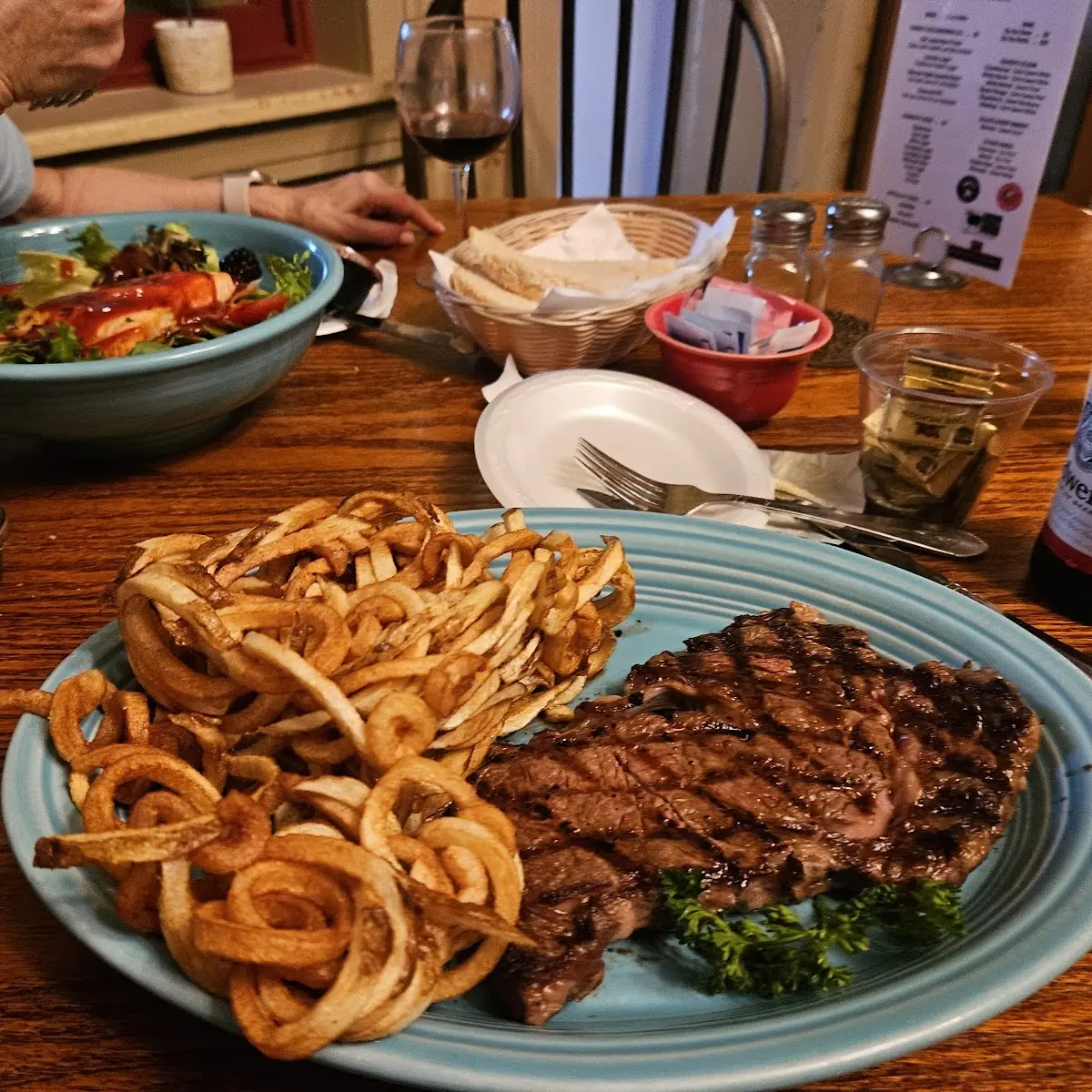 12 Oz Ribeye Steak with Curly Fries