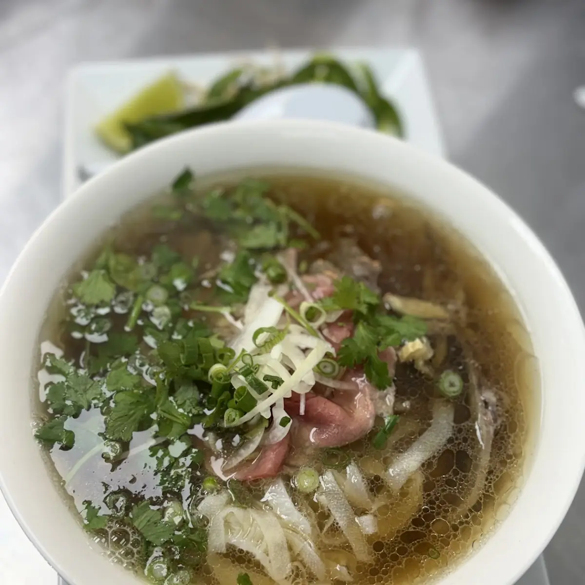Beef Pho with Fresh Herbs and Lime