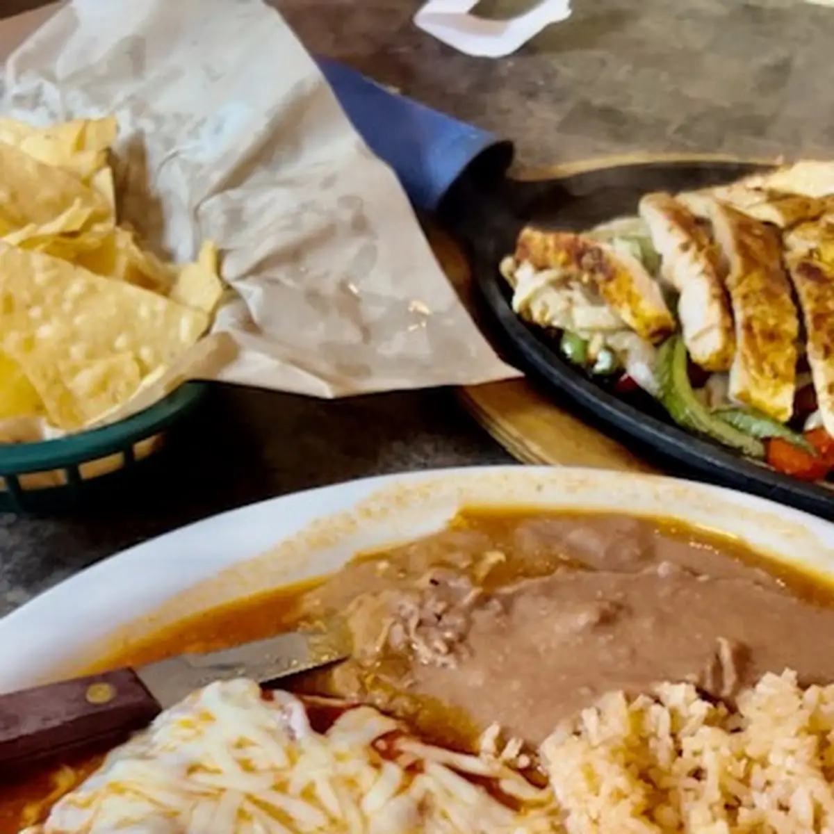 Refried Beans with Melted Yellow Cheese