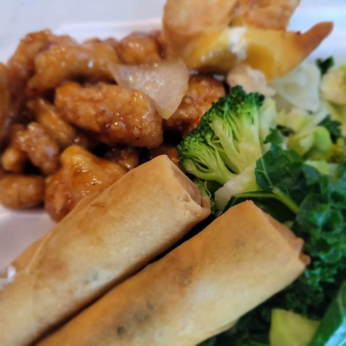 Orange Chicken Super Greens and Spring Rolls