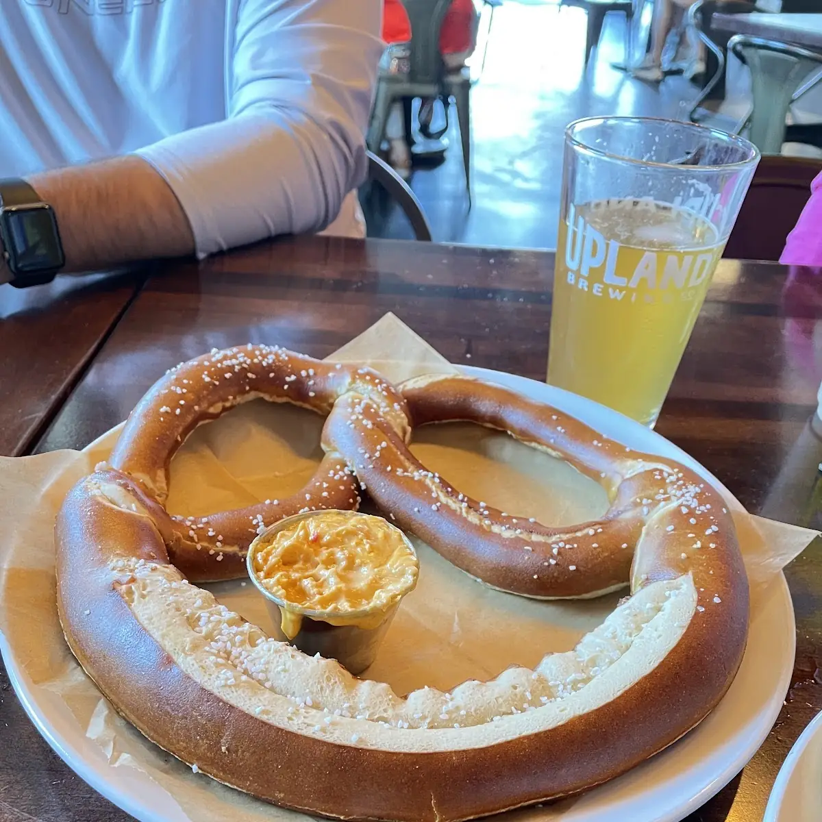 Soft Pretzel Shown with Beer Cheese