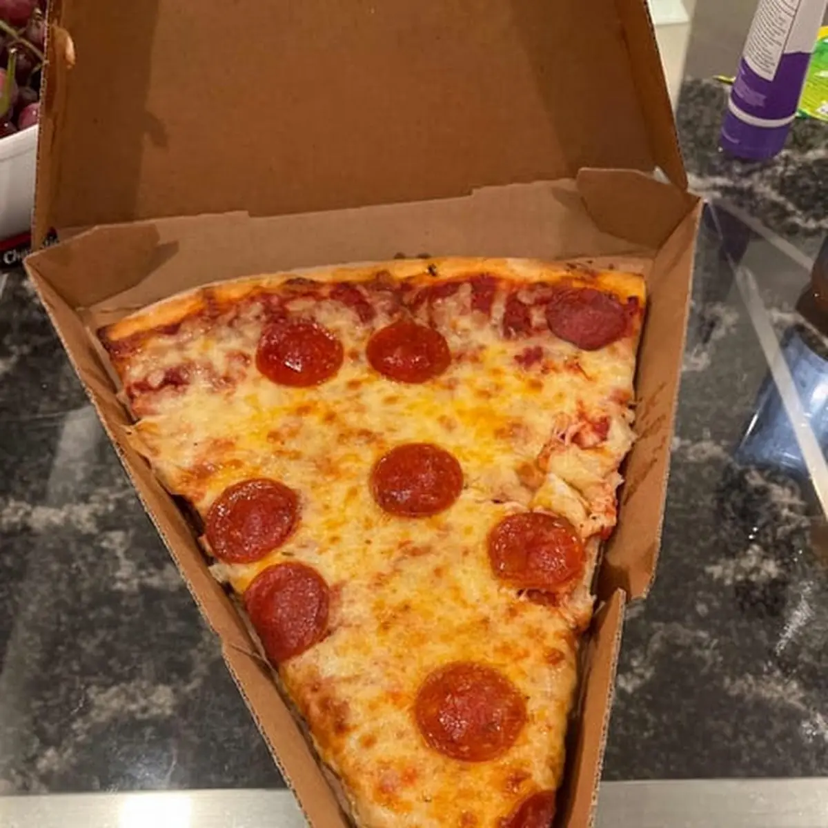 Large Pepperoni Pizza Slice