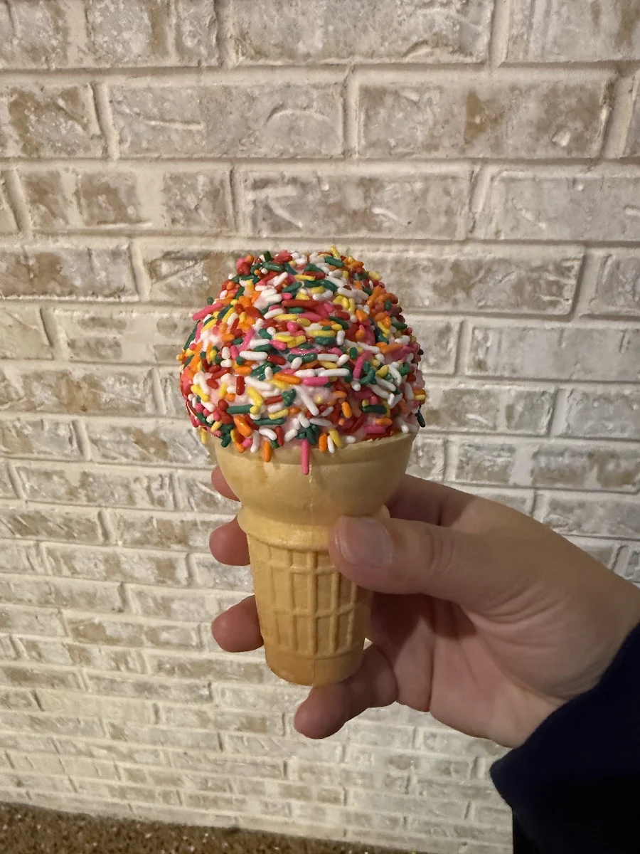 Strawberry Ice Cream on a Cone with Rainbow Sprinkle