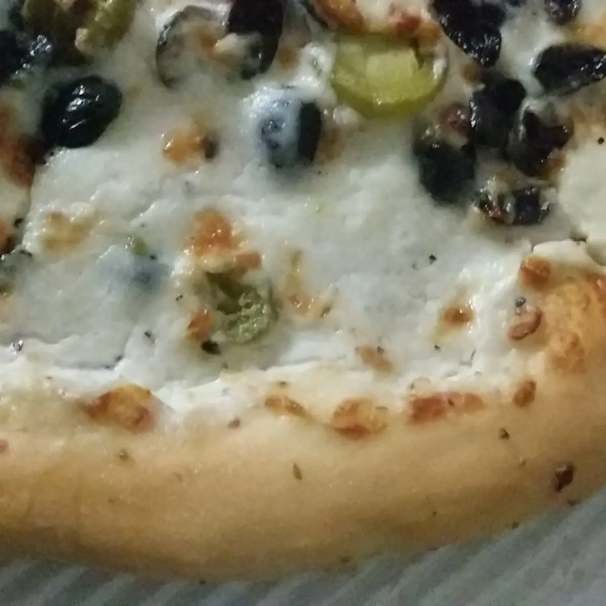 Pizza Hut Pizza with Olives and Jalapeños