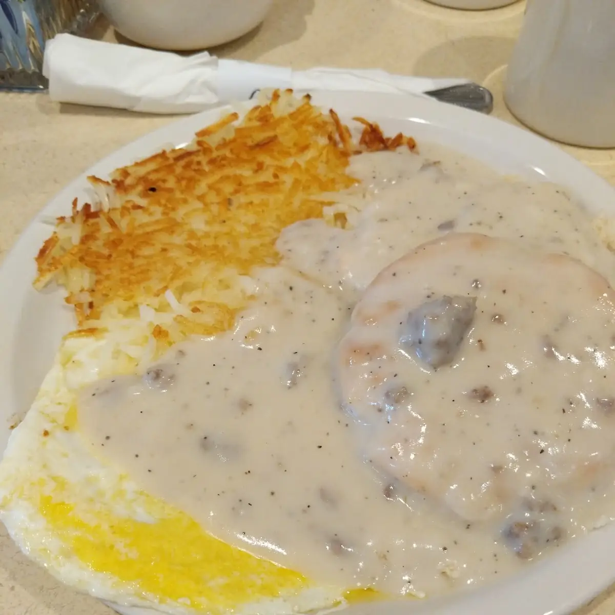 Hash Browns Eggs and Corn Beef Hash Biscuits and Gravy
