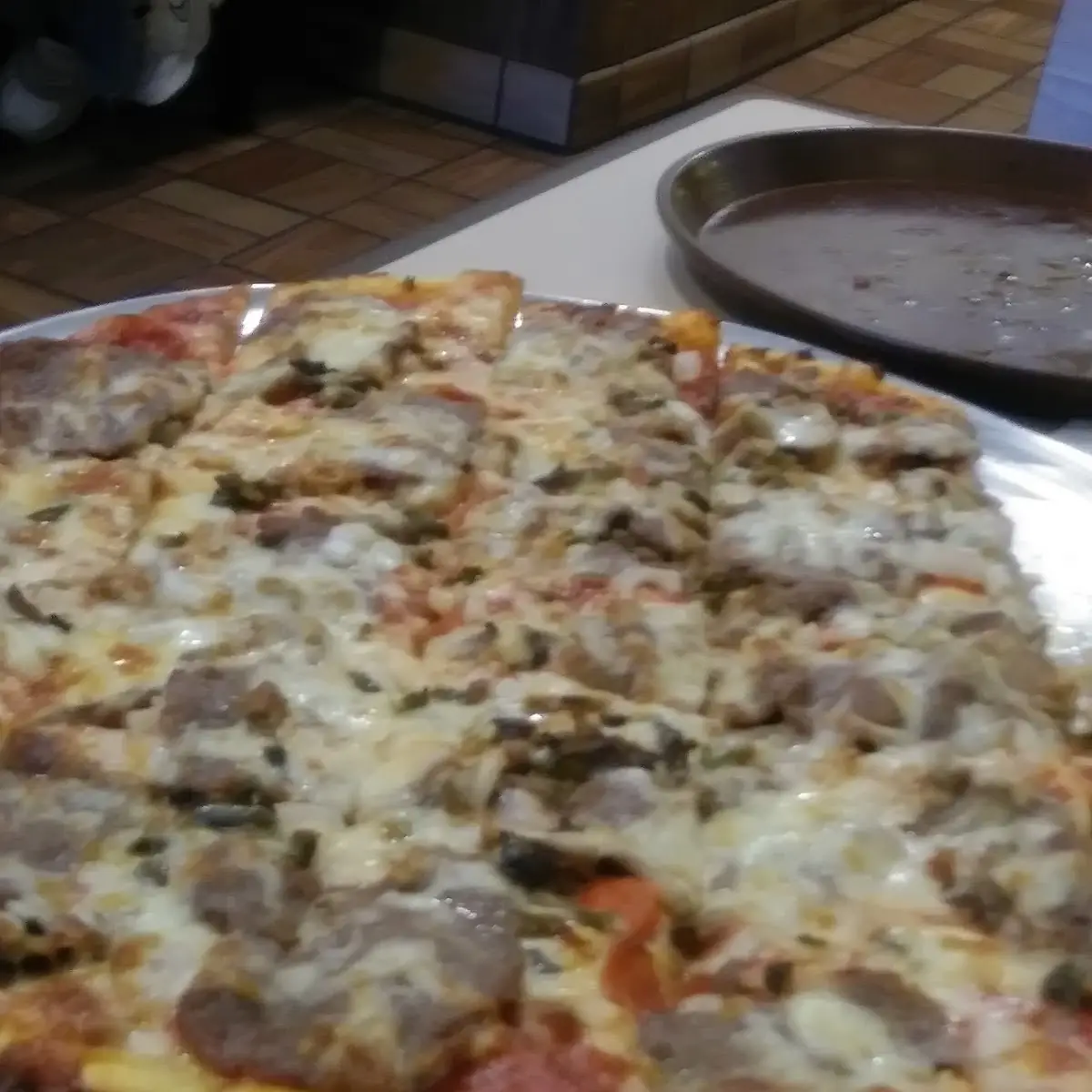 Ham Pepperoni and Sausage Pizza