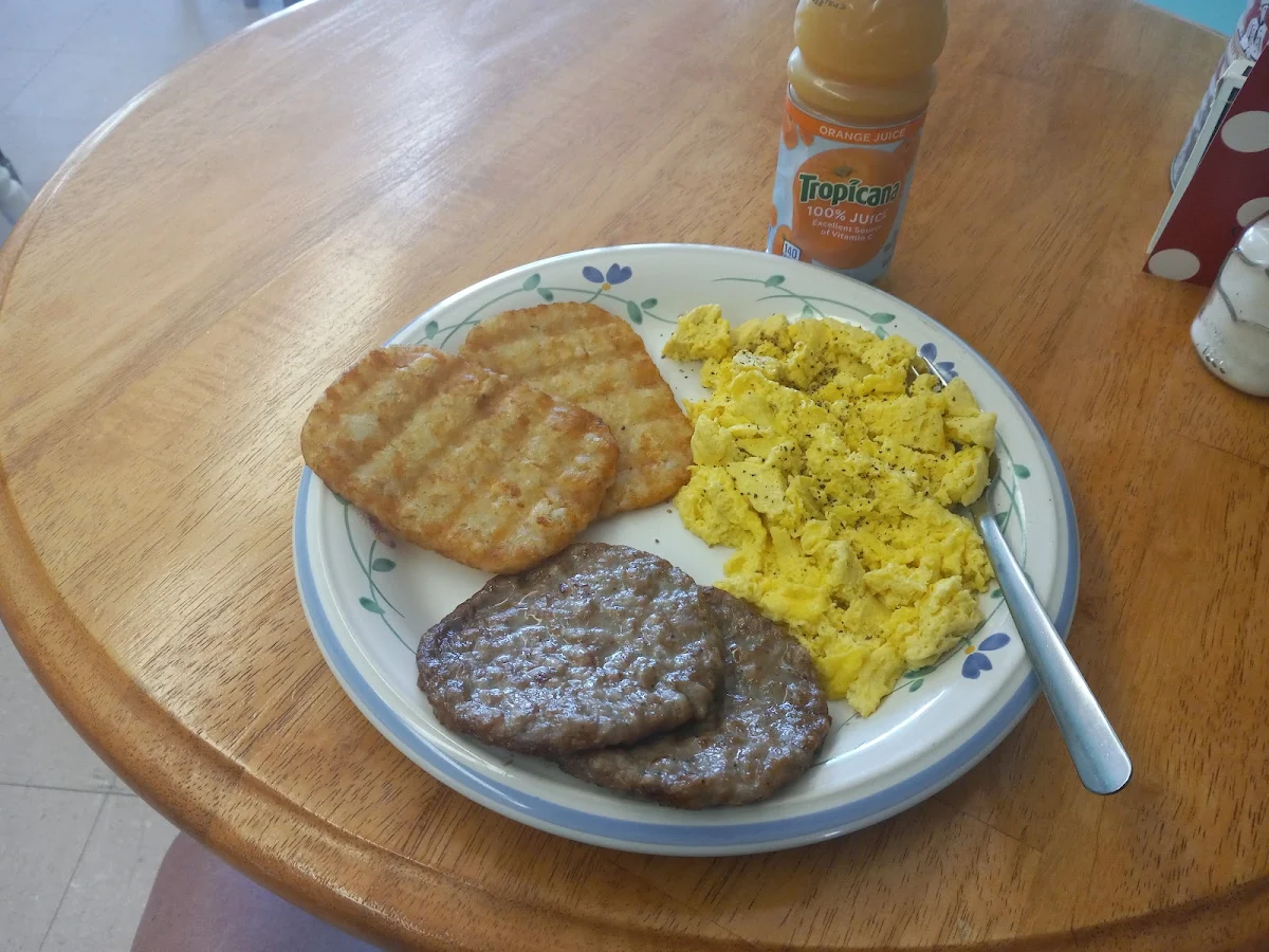 Scrambled Eggs Sausage Patties and Hash Browns