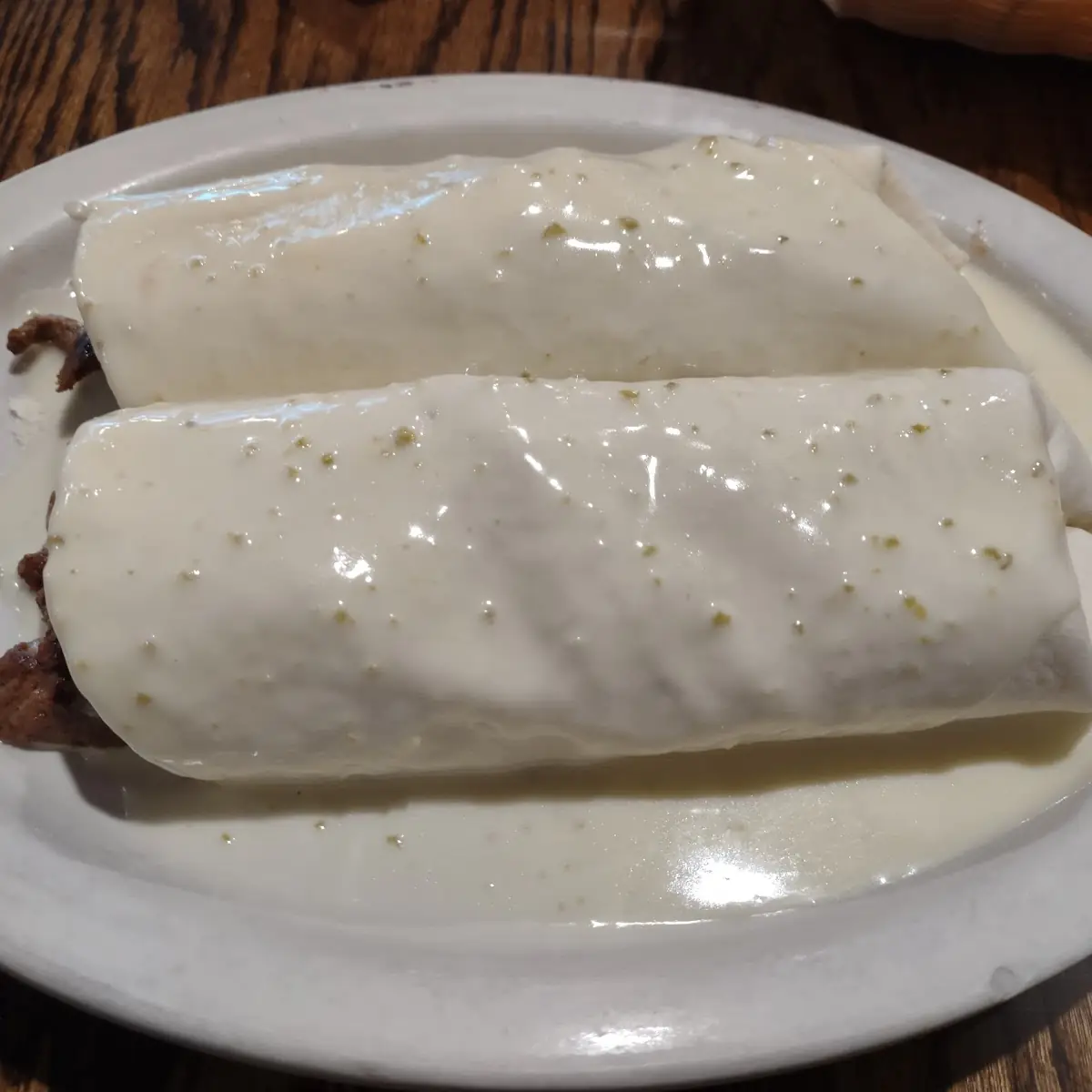 2 Steak Burritos with White Cheese Sauce
