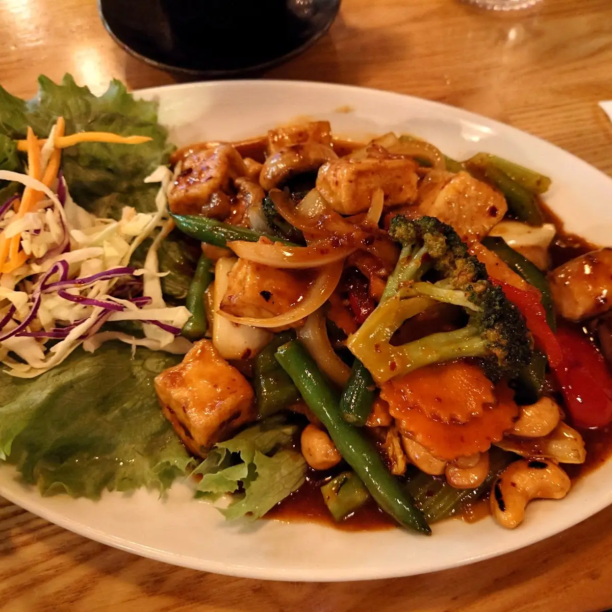 PAD CHA SEAFOOD IN PINEAPPLE