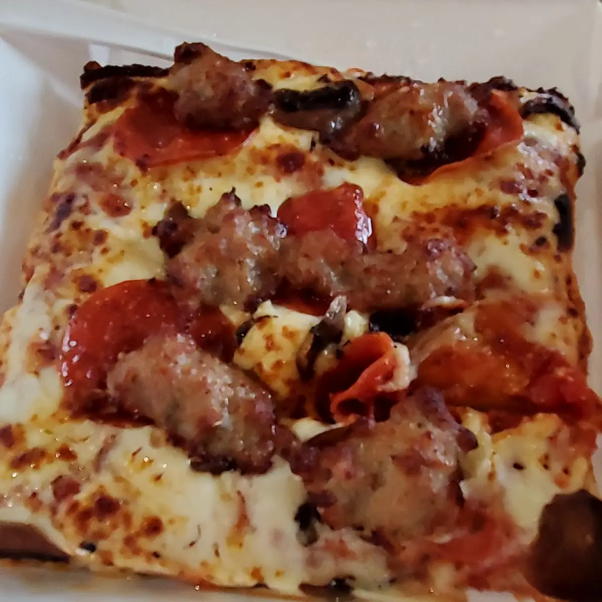 Sausage Pepperoni Pizza Slice