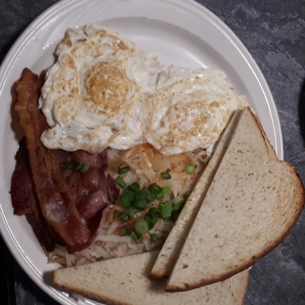 Eggs Bacon Hash Browns and Sourdough Toast