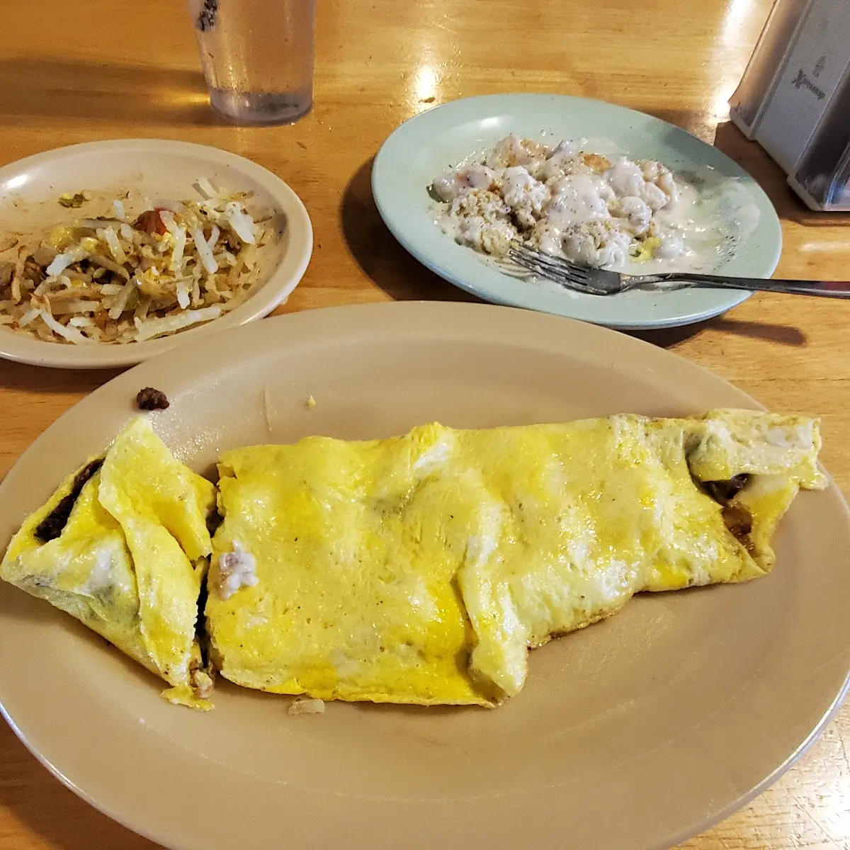 Loaded Hash Browns Biscuits and Gravy and a Western Omelette