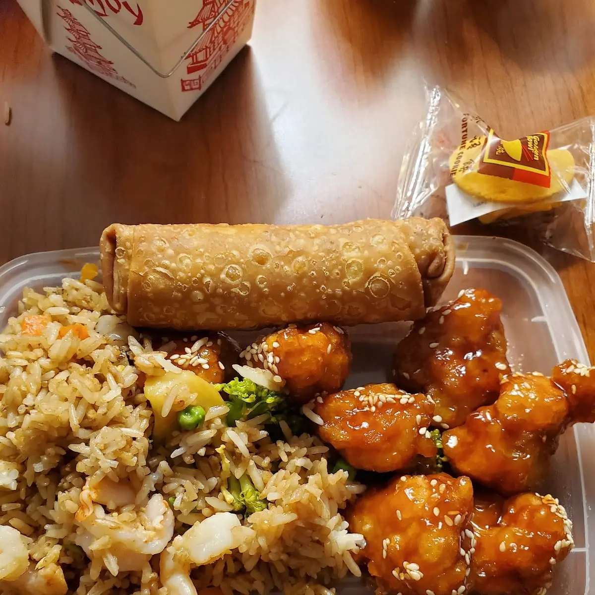 Sesame Chicken with Shrimp Fried Rice and Egg Roll