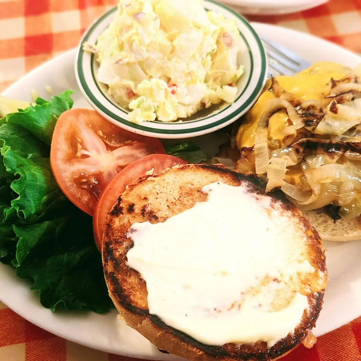 Cheeseburger with Grilled Onions and Potato Salad