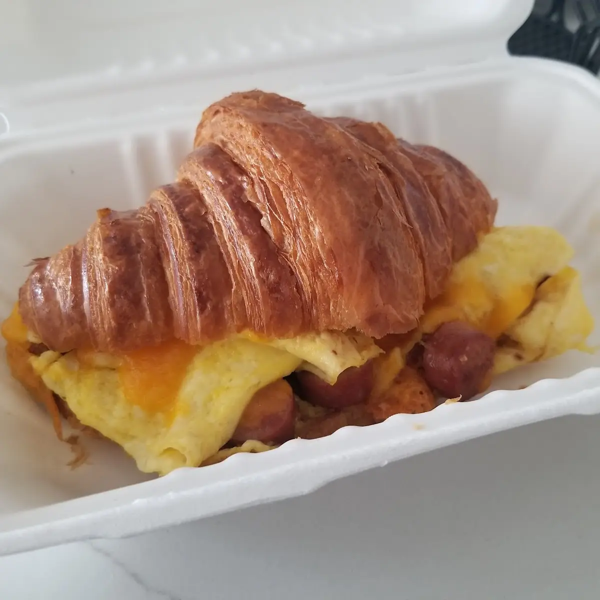 Sausage and Scrambled Eggs Croissant