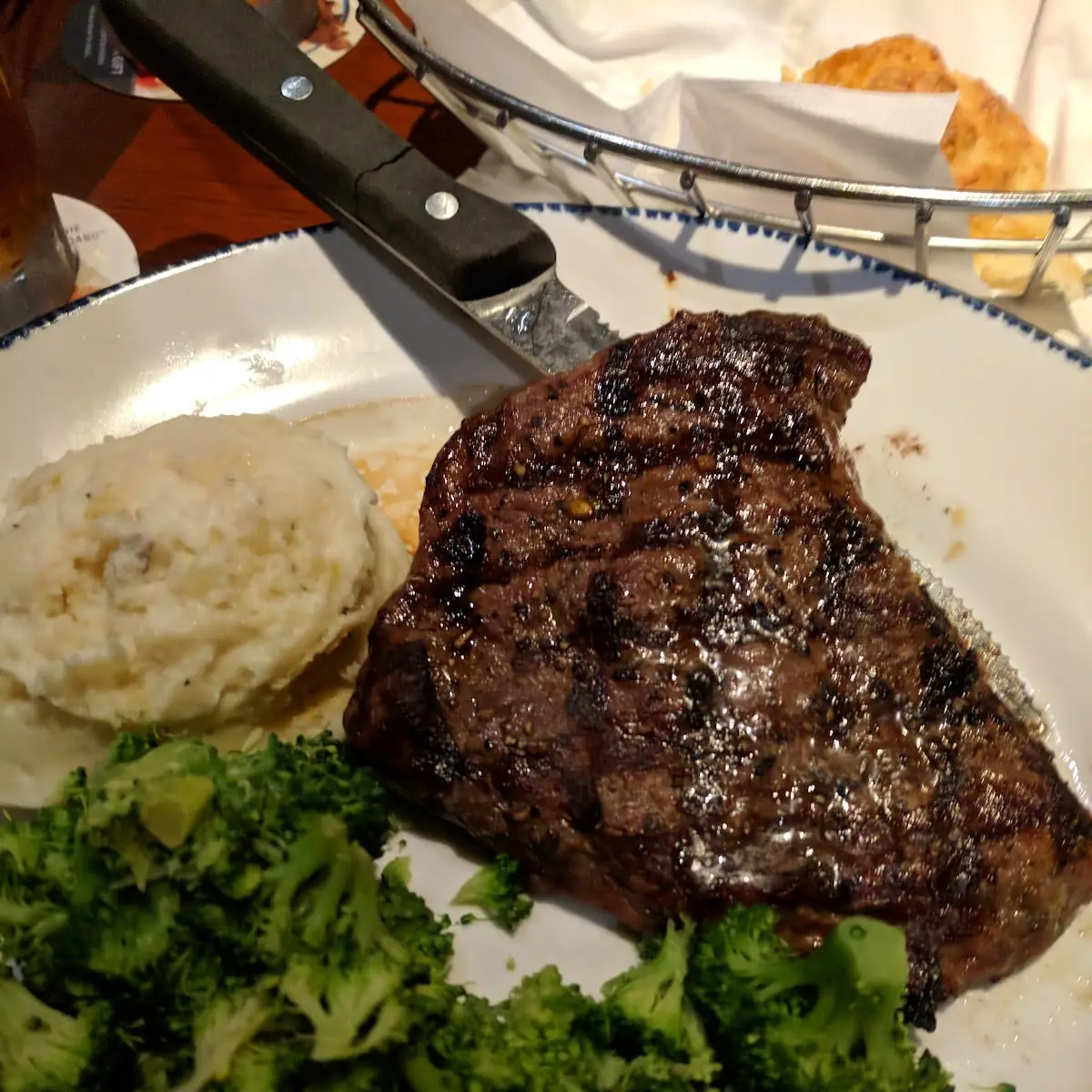 New York Strip Steak with Baked Potato and Broccoli