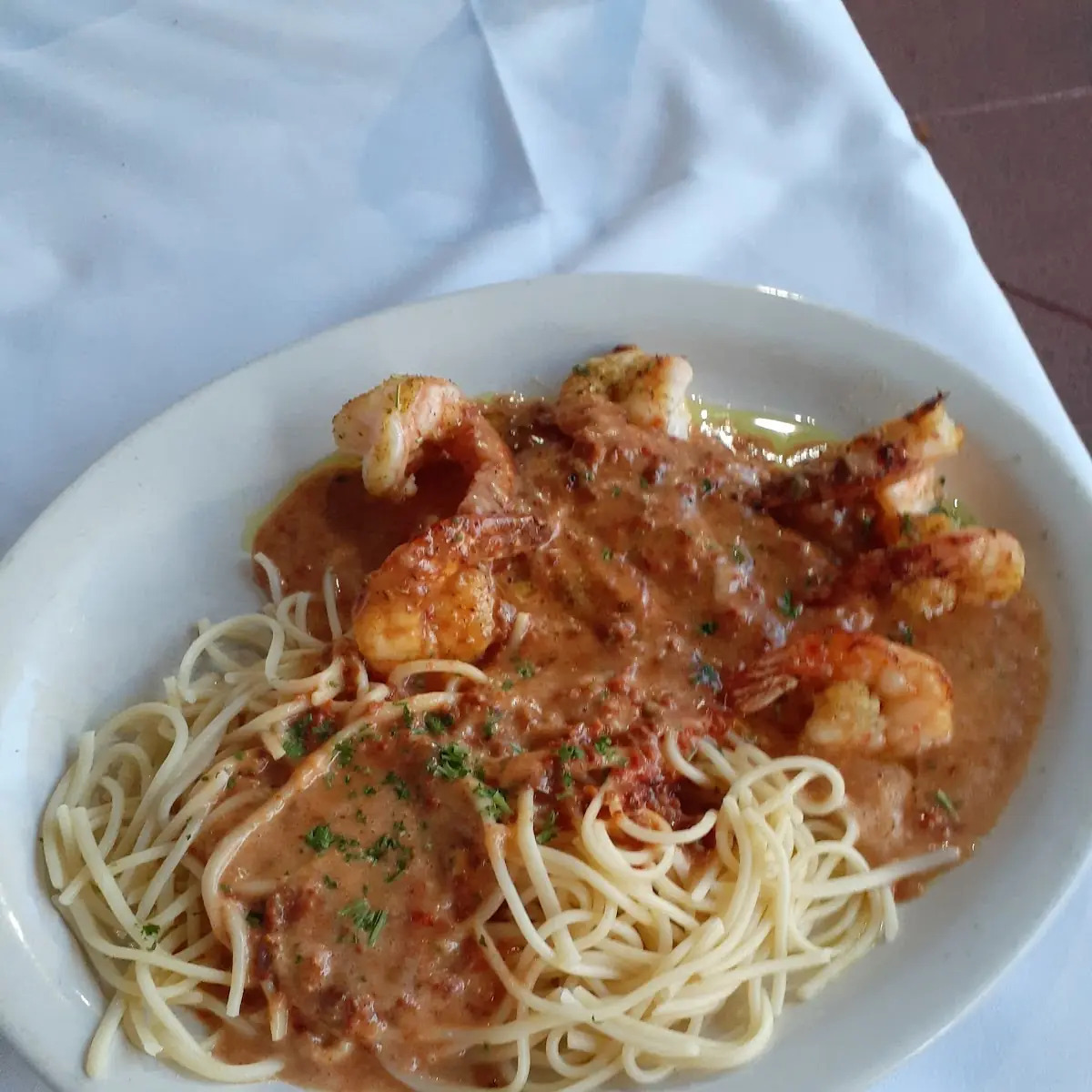 Shrimp and Fish in Sun Dried Tomato Sauce with Pasta
