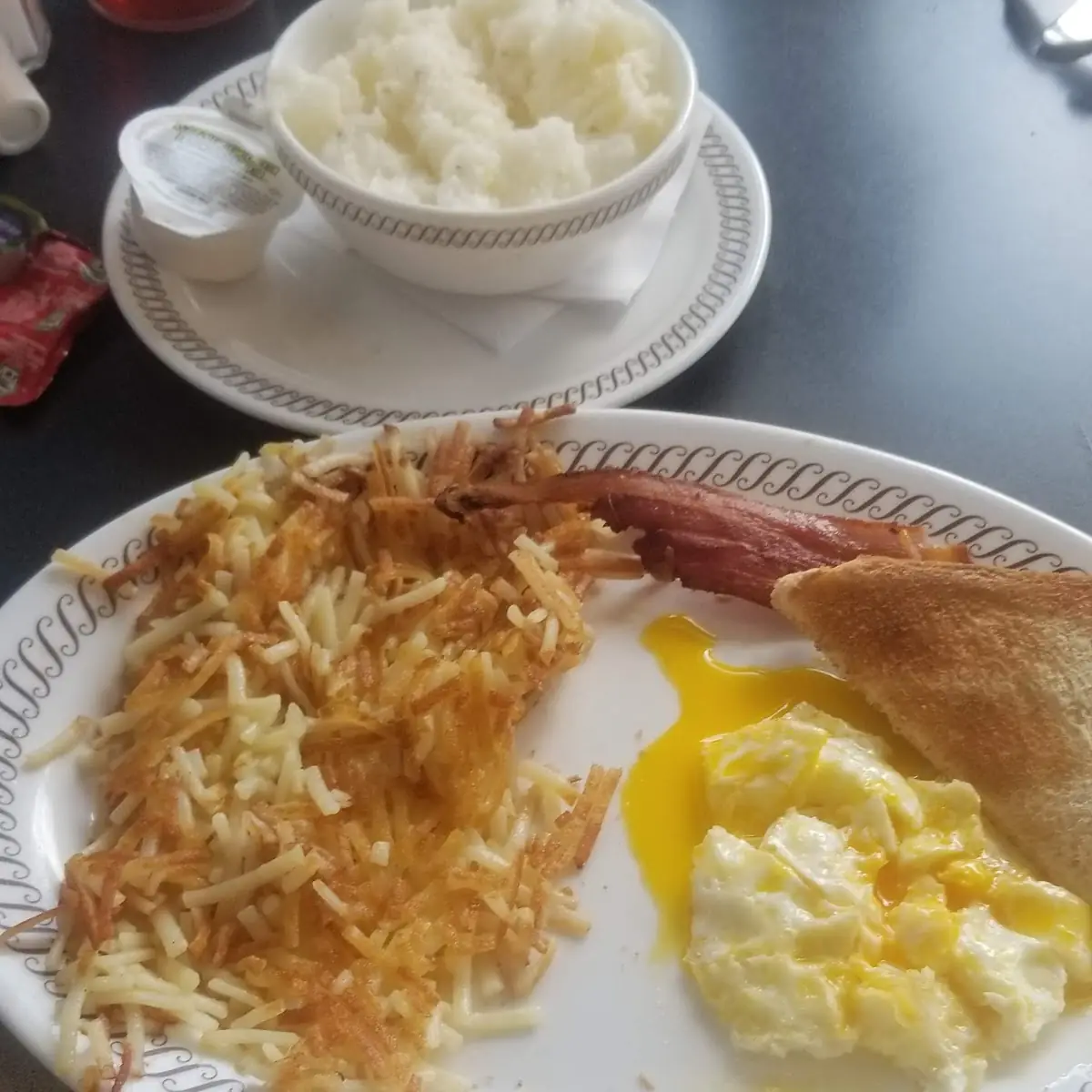 Eggs over Medium Hash Browns Grits & Bacon