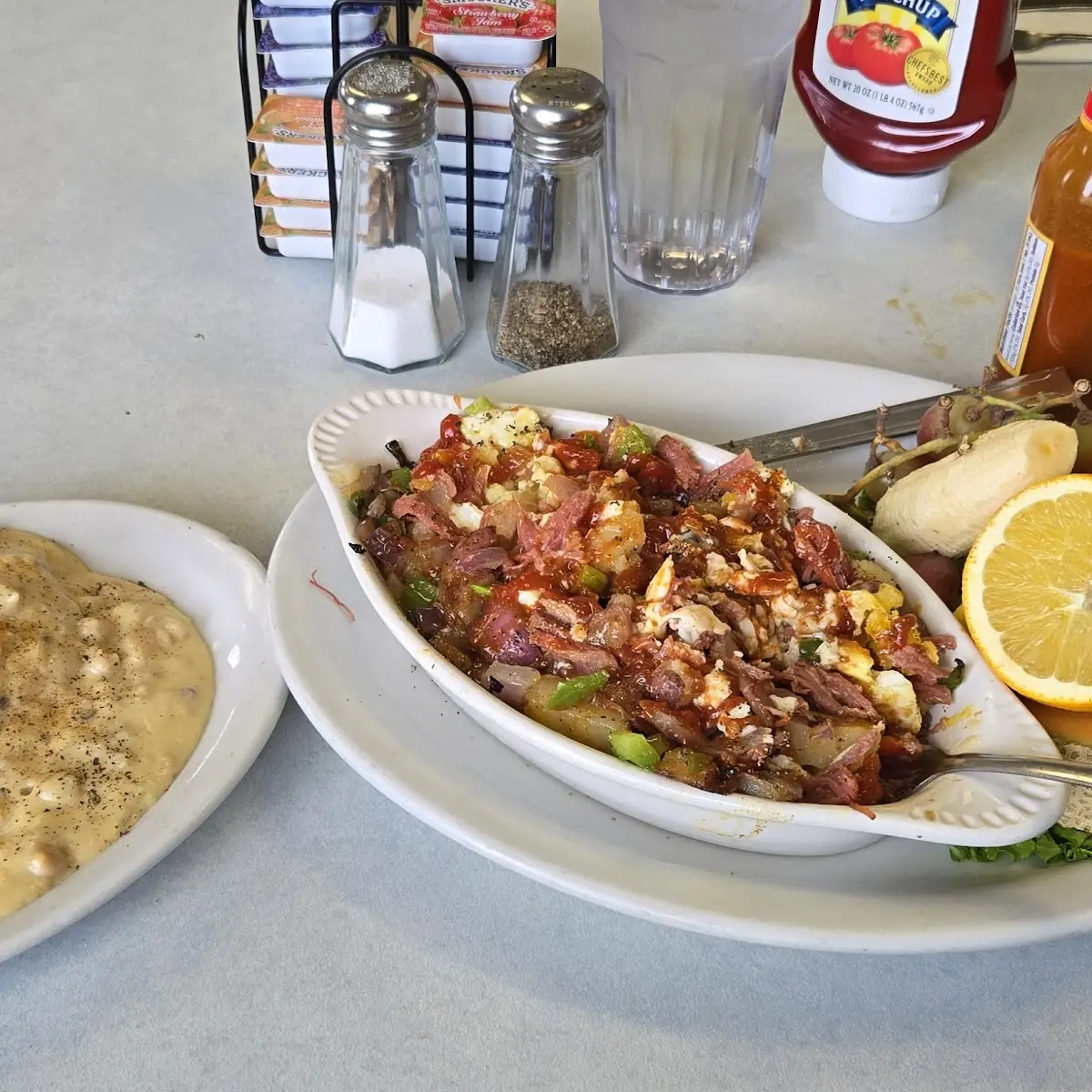 Corned Beef Hash and Eggs with Biscuits and Gravy