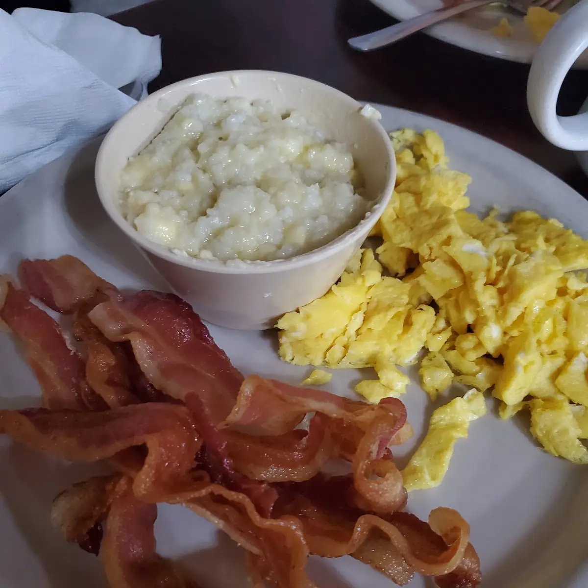 Scrambled Eggs Bacon and Grits