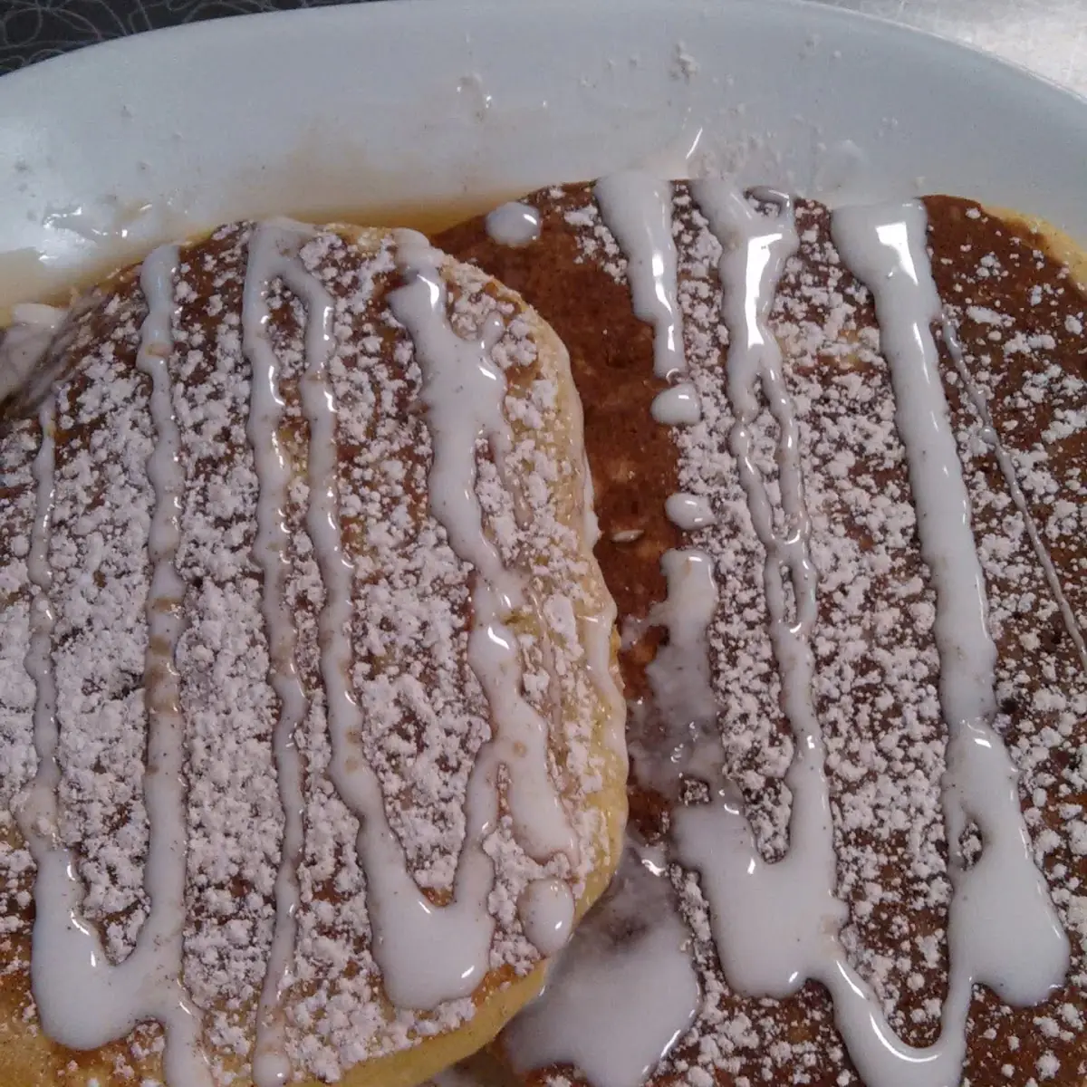 Cinnamon Roll Pancake with White Chocolate Drizzle