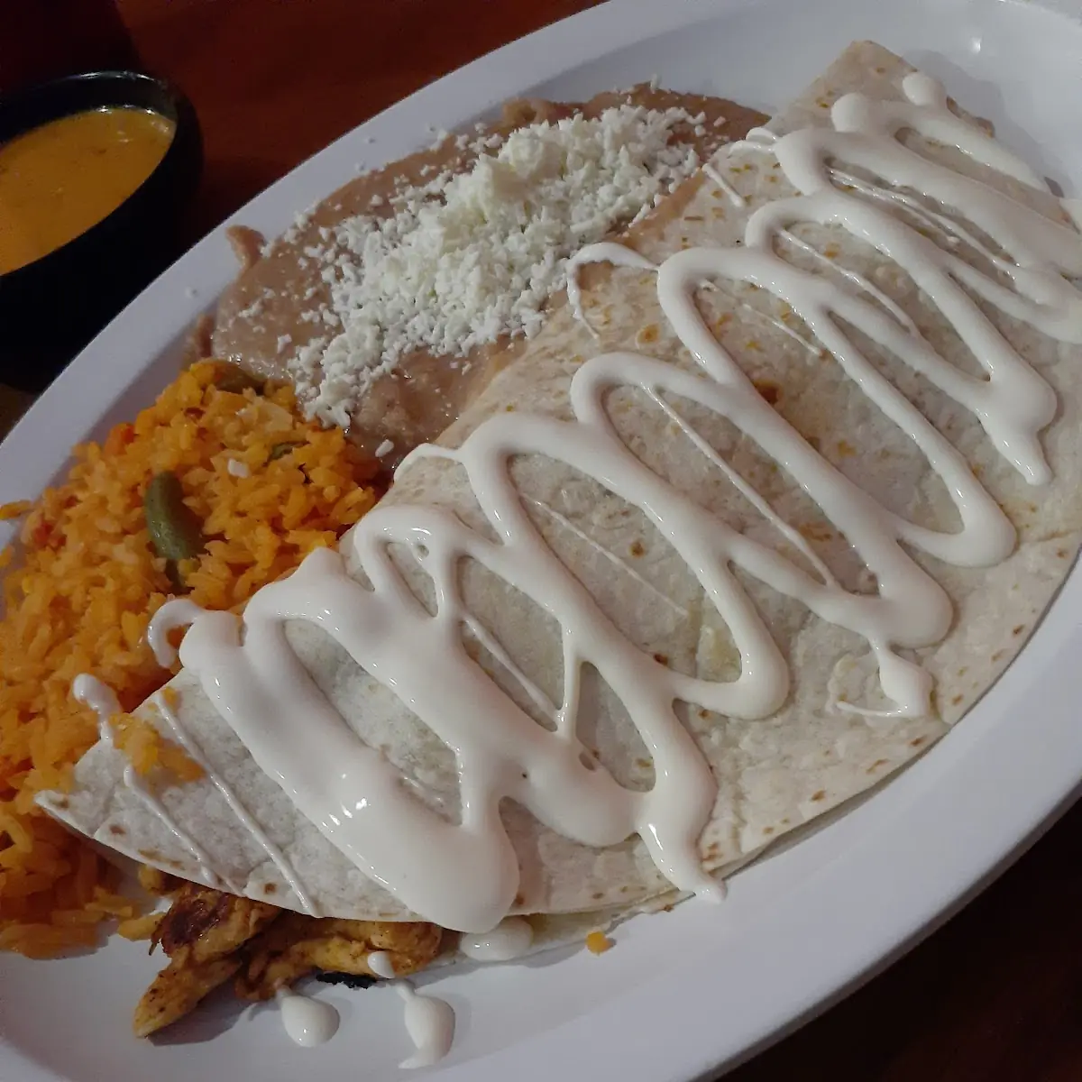 Enchilada Con Arroz & Frijoles