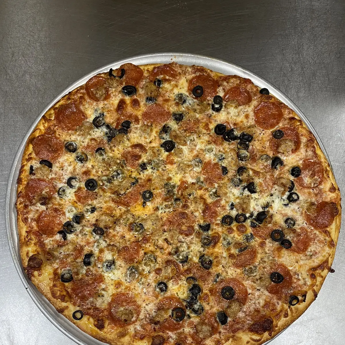 Pepperoni Sausage and Olive Pizza