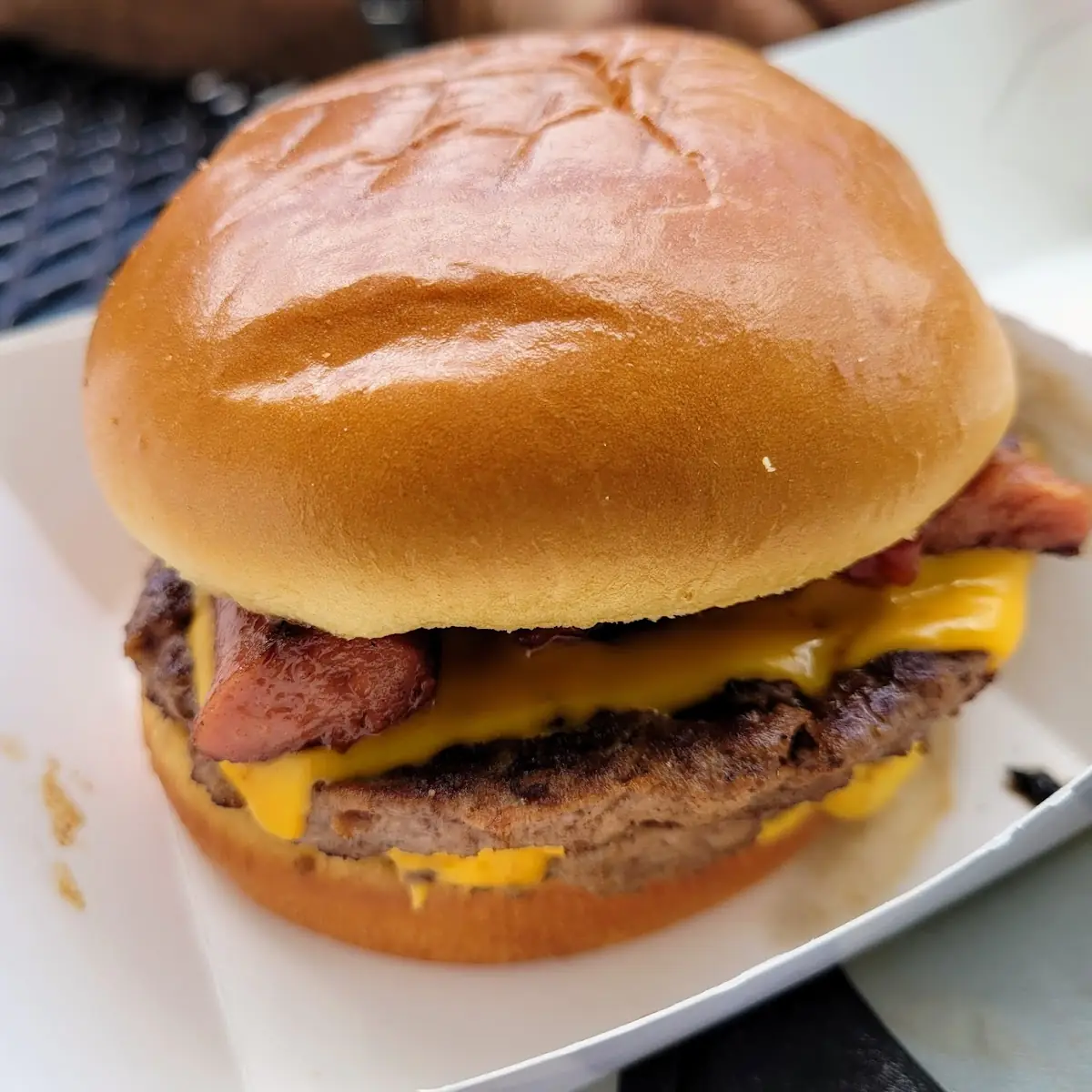 Double Cheeseburger with a Grilled Hot Dog on Top