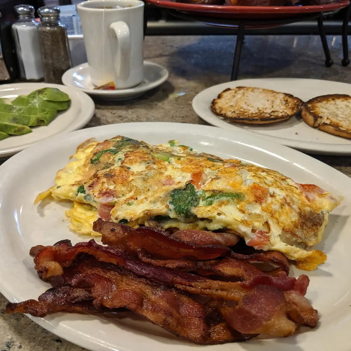 Garden Three Eggs Omelette with Bacon and Avocado and English Muffin