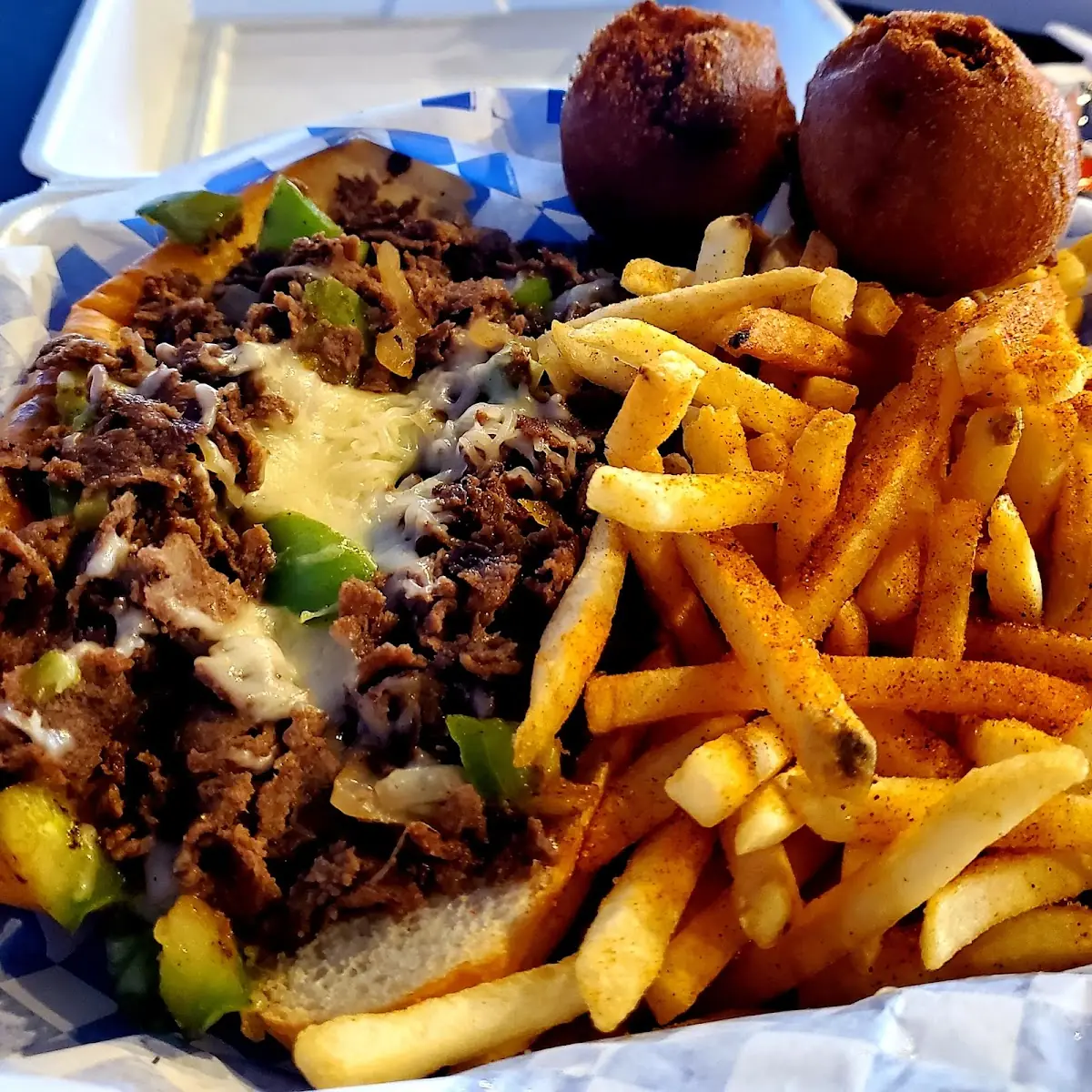 Philly Cheese Steak Sandwich and Fries