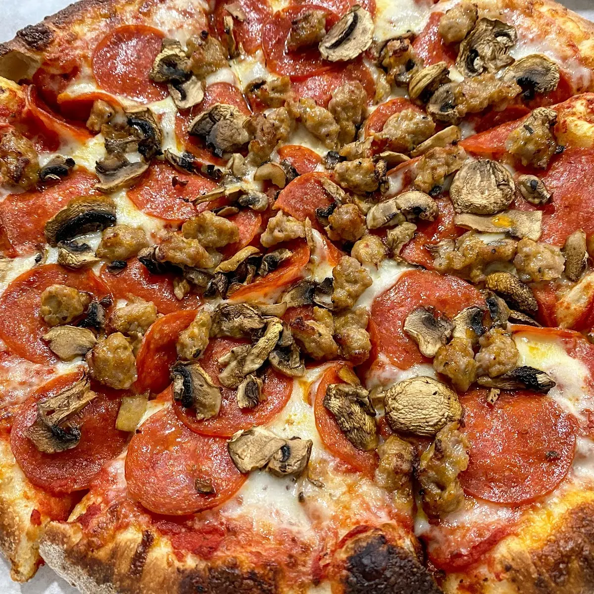 Pepperoni Sausage and Mushroom Pizza