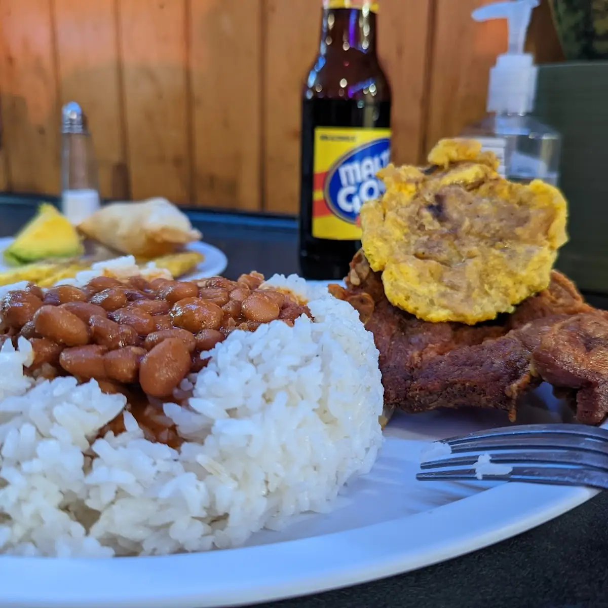 Arroz Con Chuleta Frita