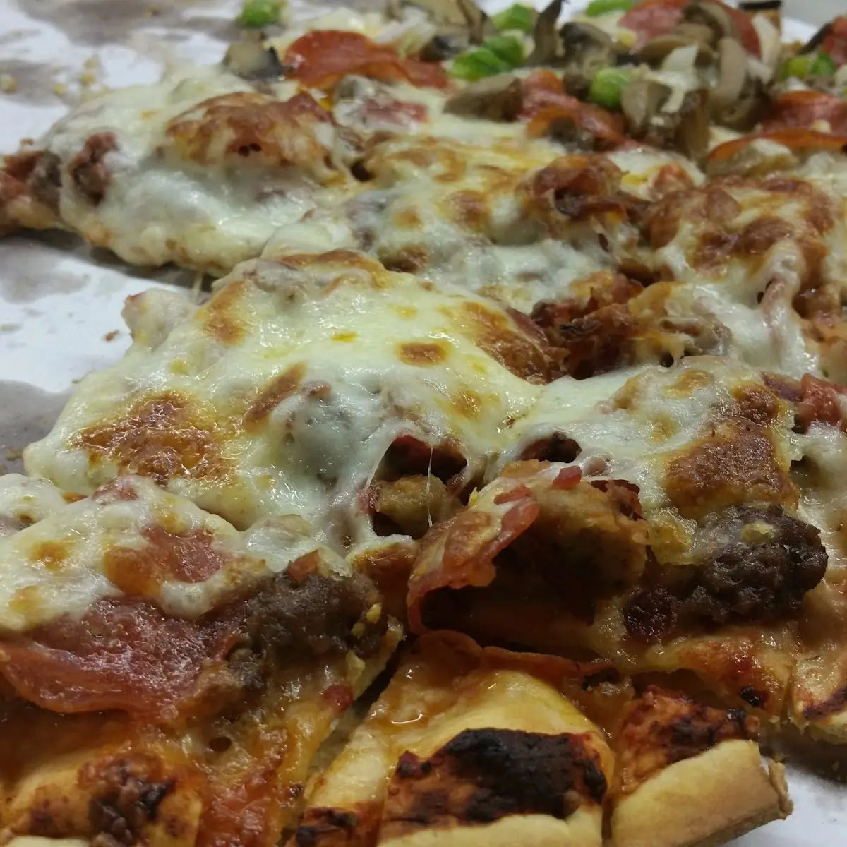 Half Meat Lovers and Supreme