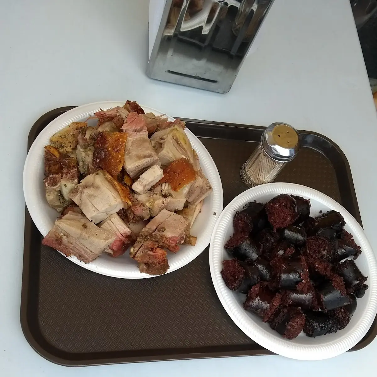 Lechón Asado Y Morcilla