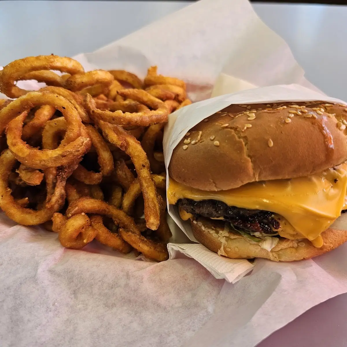 Triple Cheeseburger and Curly Fries