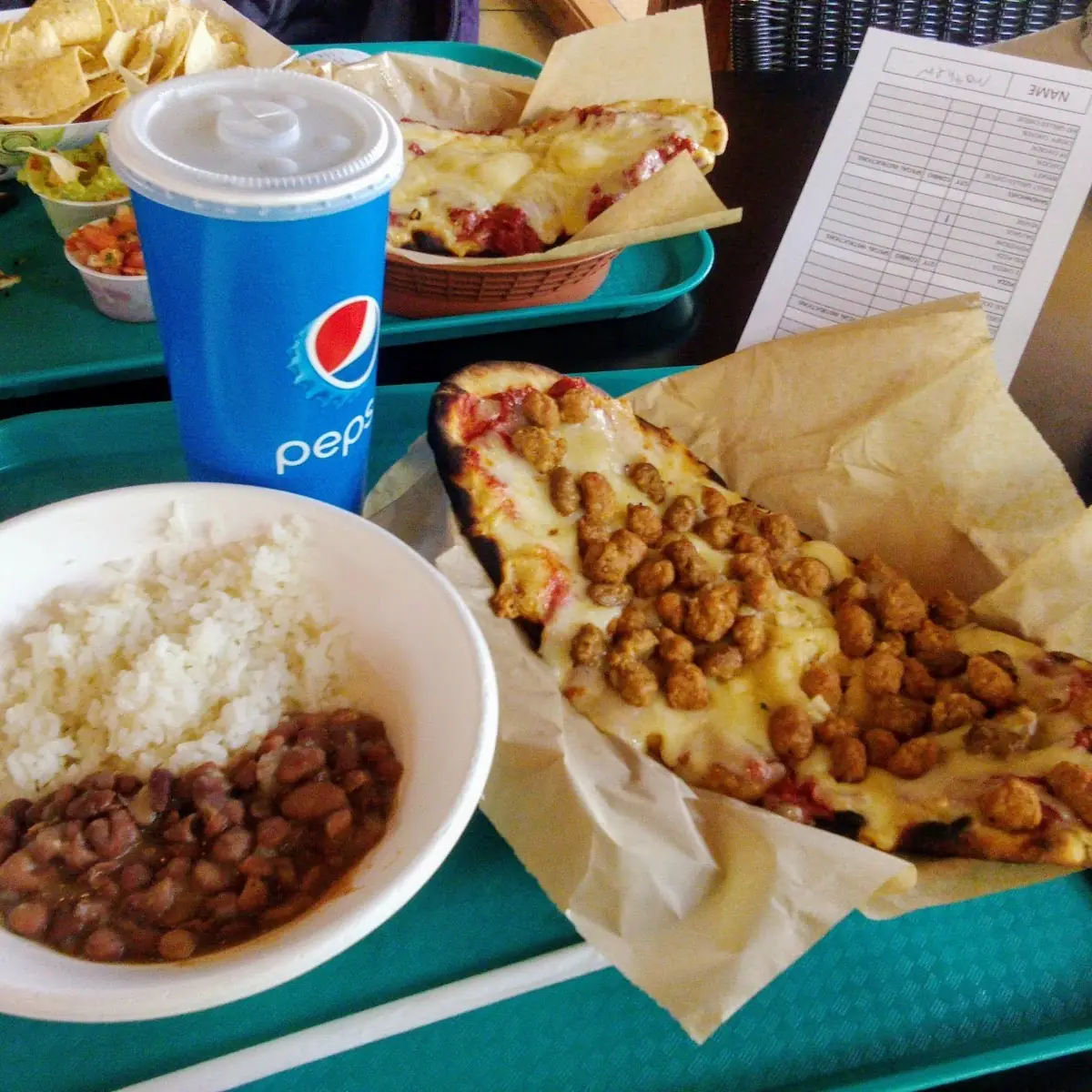 Beans and Rice Soft Drink Sausage Pizza