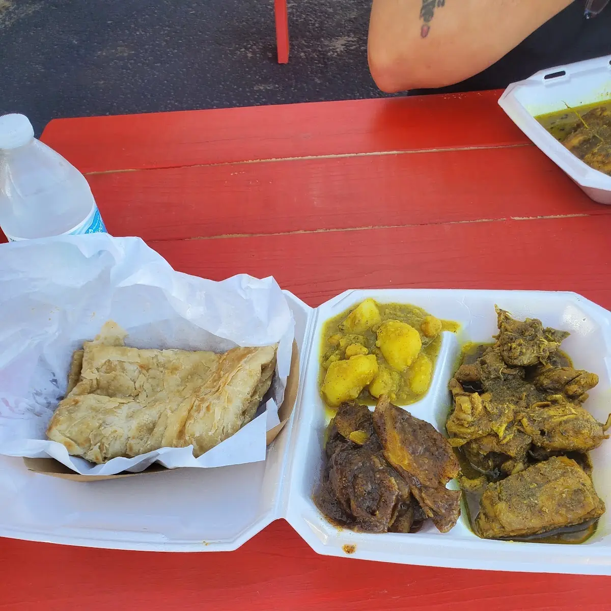 Brown Stew Chicken Roti