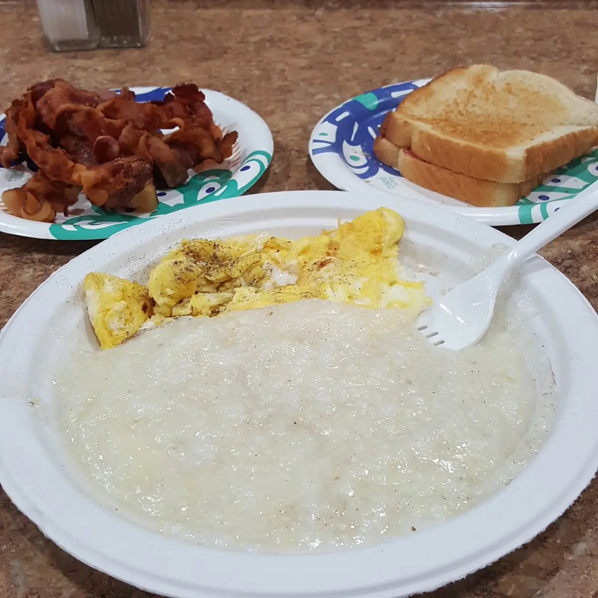 Grits Scrambled Eggs and Bacon with Toast