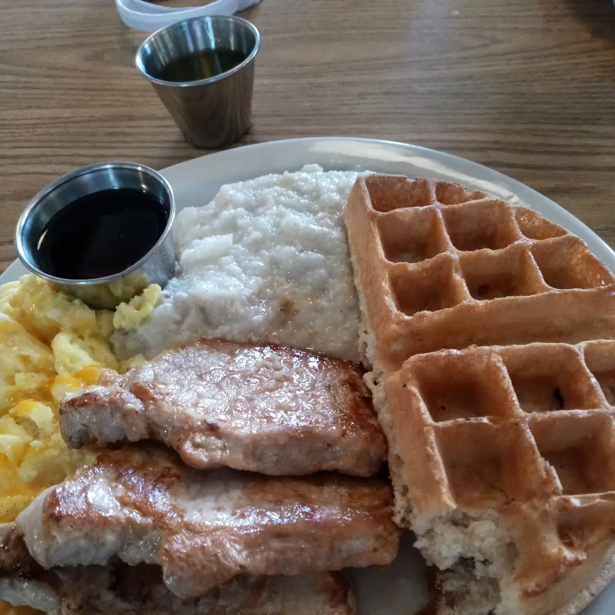 Three Pork Chops Waffle Grits and Cheesy Scrambled Eggs