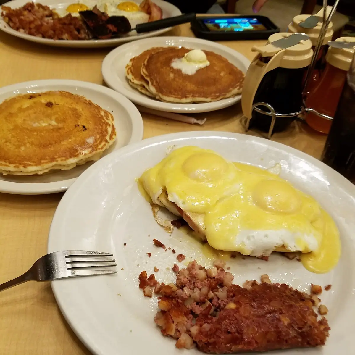 Eggs Benedict with Corned Beef Hash and Pancakes