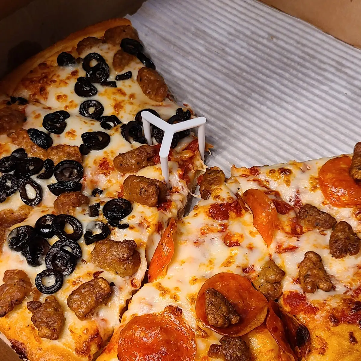 Incorrectly Made Olive Pizza with Half Pepperoni Half Sausage
