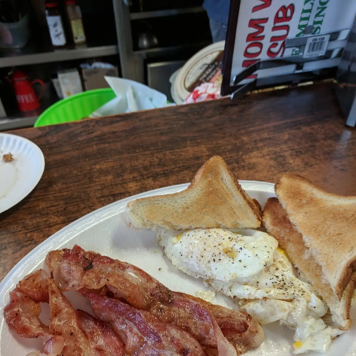 Bacon with Two Eggs over Easy and a Hash Brown