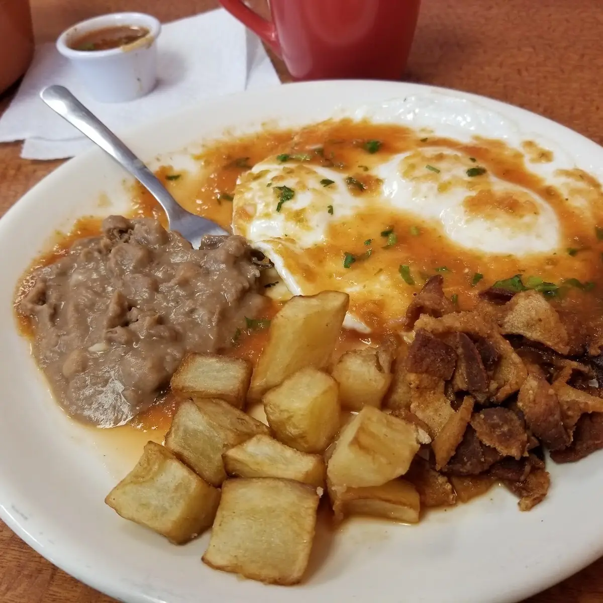 Chilaquiles with Eggs & Carne Asada