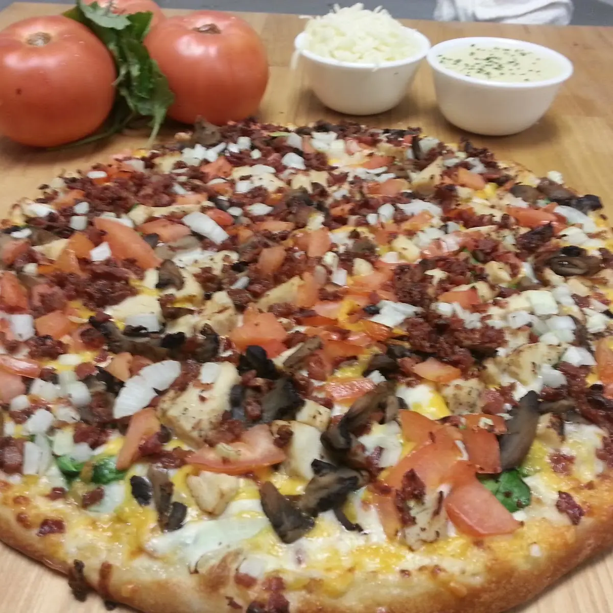 Larg Supreme Pizza with Extra Cheese Pizza and Bacon